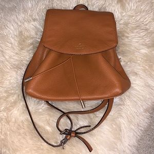 Kate Spade pebbled leather sinch backpack in brown